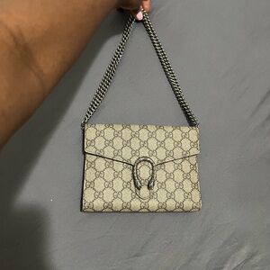 Gucci Beige Monogram Clutch with Chain comes with original dust bag